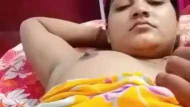 Desi fatty poses in XXX clip with young man who plays with her tits