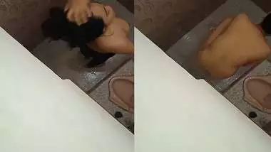 Desi young girl changing cloths and pissing